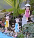 Amazing 4 Little And Colorful Girls Garden Figurine