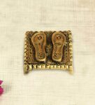 Antique Golden Aluminium Charan Paduka On A Metal Base With Antique Golden Finish Idol