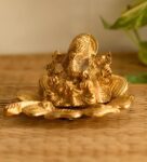 Gold Metal Ganesha On Flower Decorative Showpiece