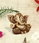 Off White Resin Seated Ganesha In Antique Ivory Finish Idol