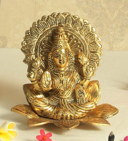 Antique Golden Aluminium Goddess Laxmi Seated On A Flower Idol