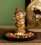 Cream Yellow Polyresin 7.5 Inches Ganesha Idol Statue With Wooden Tray Candle Holder & Pebbles